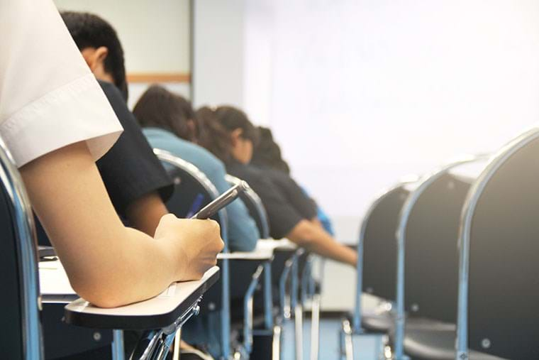 Students take a test in class