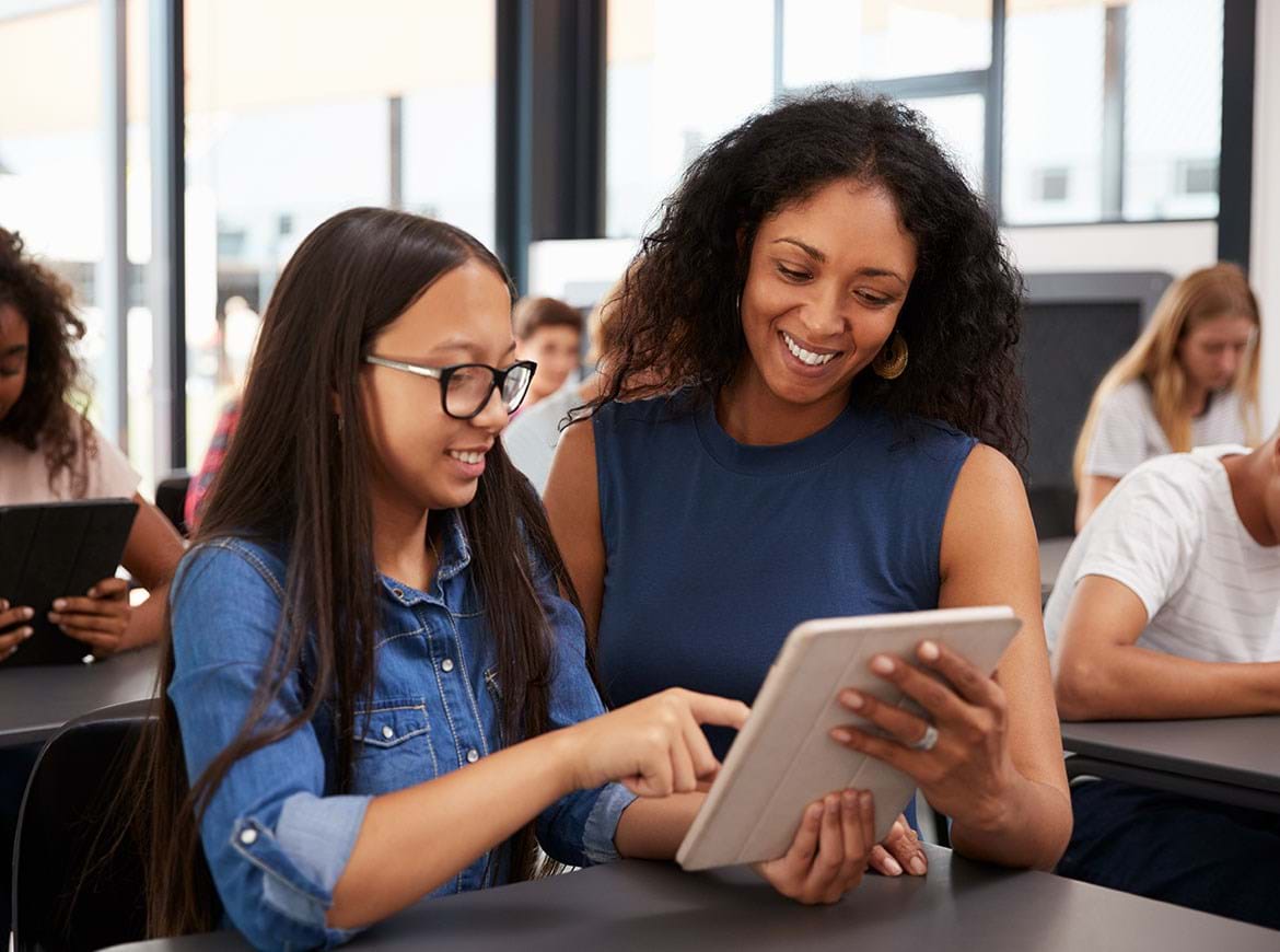Student And Teacher With Tablet