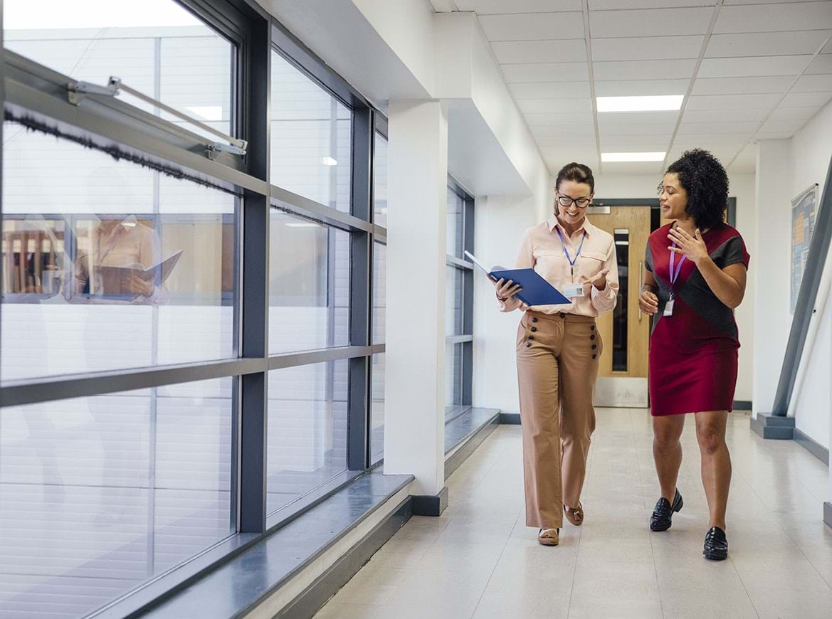 Teachers In Corridor