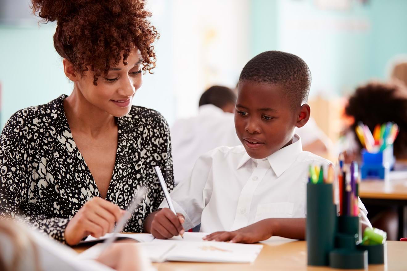 Teacher Helps Pupil (1)